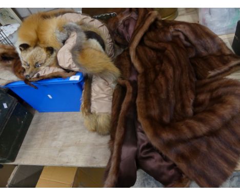 A vintage ladies three quarter length fur coatAnd a collection of fur stoles. 