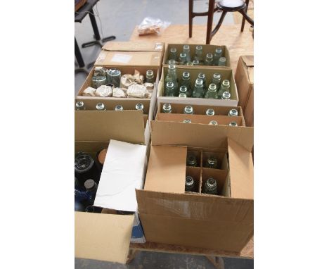 A large collection of vintage marble glass bottlesApproximately 80 and a small collection of chemical bottles. 