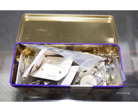 A collection of reproduction military cap badgesTo include Scots Guards, various enamel badges (qty) to a tin box. 