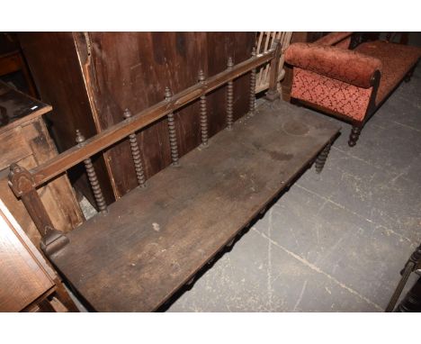 A 19th Century Gothic Oak Bench with Bobbin Turned Spindles Later reconstruction Play in joints. 