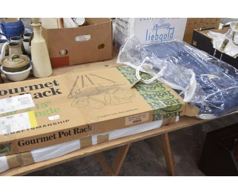 A Lynton hanging pan rackA boxed Gourmet hanging pan rack and a pair of modern blue curtains. 