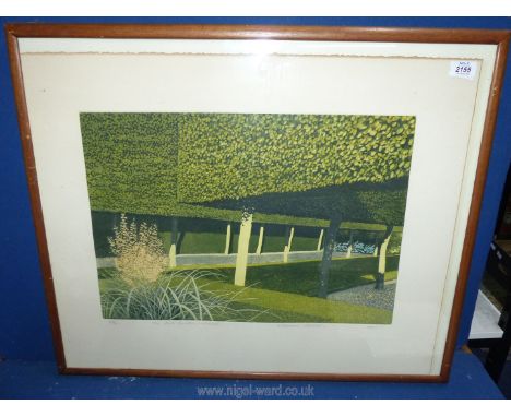 A wooden framed limited Edition no. 25/90 Print titled 'The Stilt Garden;  - Hidcote', signed in pencil by the artist Norman 