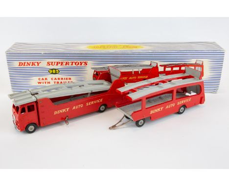 Dinky Supertoys Car Carrier With Trailer (983). In red with grey decks and 'Dinky Auto Service' to sides. Boxed, with packing