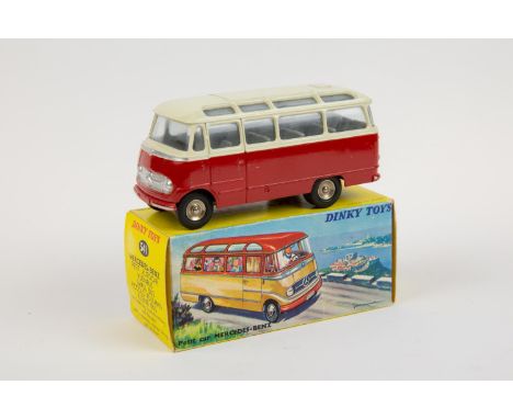 French Dinky Toys Mercedes-Benz 'Petit Autocar' (minibus). An example in dark red and ivory livery, with light grey interior,