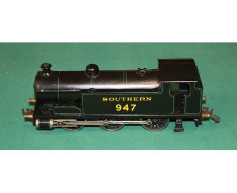 A Bassett-Lowke  12V 0-6-0 tank locomotive. A 3-rail electric example finished in Southern Railway green lined black livery, 