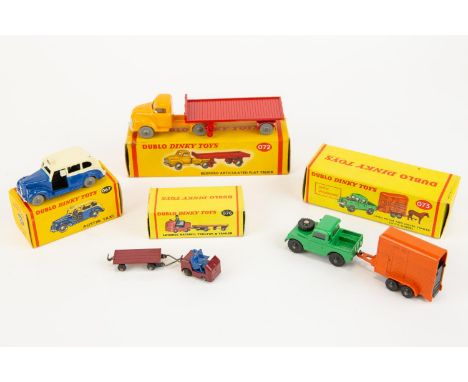4 Dublo Dinky Toys. Austin TAXI (067) in blue and cream with grey wheels. Bedford Articulated Flat Truck (072) in red and ora