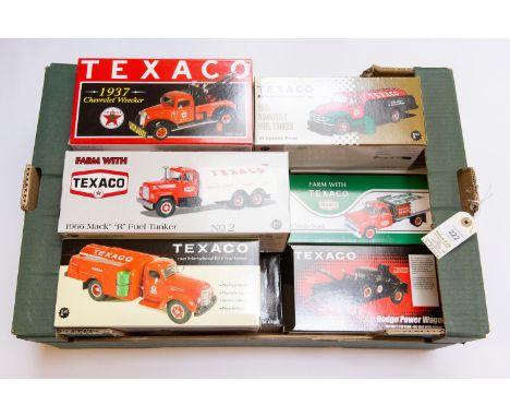 9 First Gear U.S. Trucks all in TEXACO livery. 2x 1966 Mack R Fuel Tankers. GMC Stake Truck. Dodge Power wagon. 1957 Internat