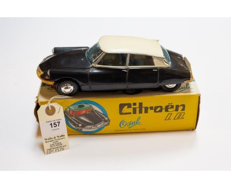 A scarce early 1960's Osul M.R. 1:24 scale plastic model of a Citroen ID DS 4-door saloon in black with cream roof, black pla