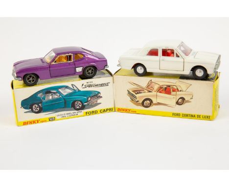 2 Dinky Toys. Ford Cortina (159). In white with red interior, with smooth spun wheels. Plus a Ford Capri (165) in metallic pu