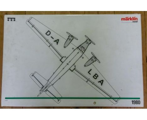 A 1996 Limited Edition MARKLIN tinplate clockwork made-up kit model of a German civilian Junkers JU52/3m Airliner. Finished i