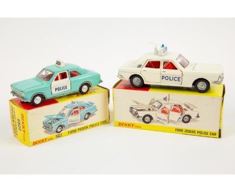2 Dinky Toys POLICE Cars. Ford Zodiac (255) in white with red interior and dark metallic grey base, sign and aerial to roof, 