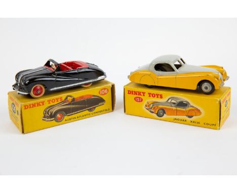 2 Dinky Toys. Austin Atlantic Convertible (106). An example in  black with silver trim, red interior, red wheels and white ty