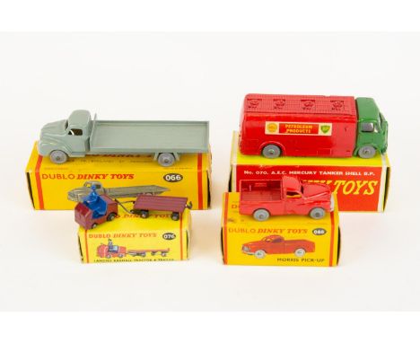 4 Dublo Dinky Toys. Morris Pickup (065). In red with grey wheels. Bedford Flat Truck (066), in grey with grey wheels. AEC Mer
