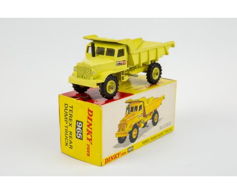 Dinky Toys TEREX Rear Dump Truck (965). In pale yellow livery, with window glazing, with one TEREX label to nearside cab door