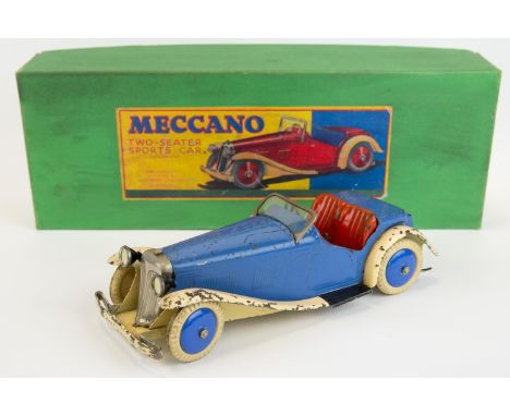 A scarce 1930's Meccano two seater sports car. An non constructor example in blue with cream mudguards/running boards, red se