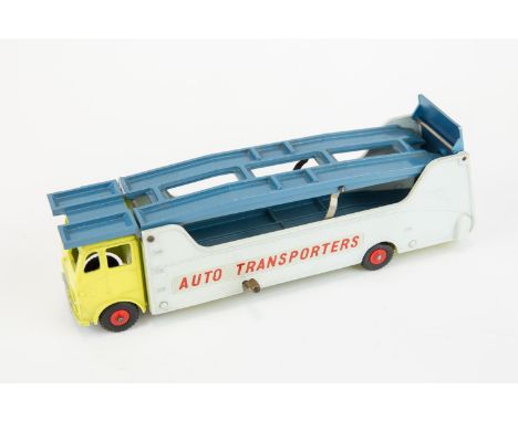 A scarce Dinky Supertoys American export Car Transporter Auto Transporter (989). Lemon yellow cab, pale grey back, metallic l