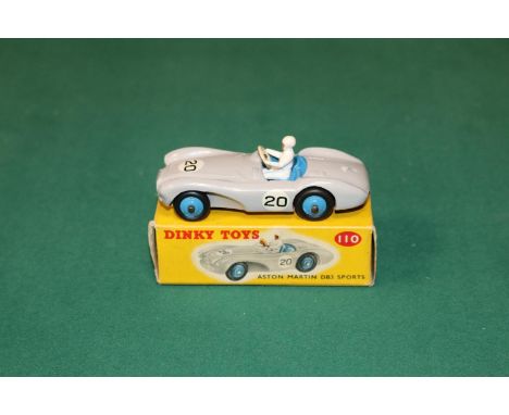 Dinky Toys Aston Martin DB3 Sports (110). In light grey with blue interior and wheels, with driver, RN20. Boxed, minor wear w