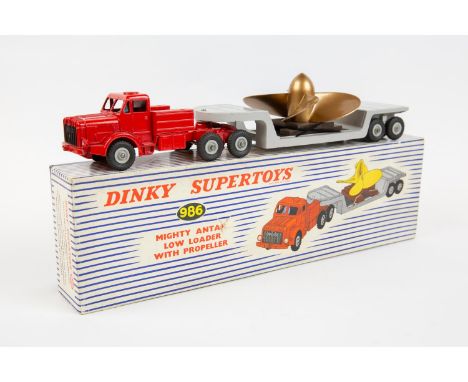 Dinky Supertoys Mighty Antar Low Loader with Propeller load (986). Red tractor unit with driver and light grey trailer, grey 