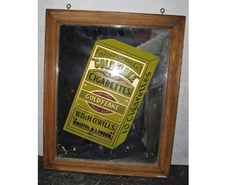A 1920S/30S ADVERTISING MIRROR depicting a Will's Cigarette packet, 'Gold Flake Cigarettes W.D.&H.O. WILLS Bristol & London' 