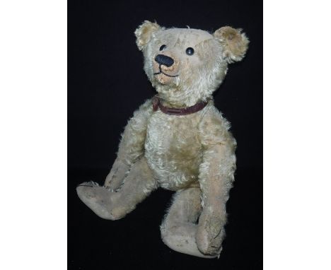 A LARGE EARLY 20TH CENTURY STEIFF TEDDY BEAR, mohair plush, centre seam, pointed snout, swivel head, pronounced humped back, 