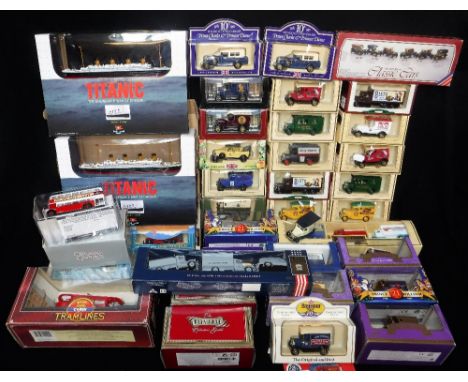 A COLLECTION OF 'DAYS-GONE' MODEL VEHICLES, two 'Claytown' models of the Titanic, A Corgi Tram, Lledo Royal Commemorative mod