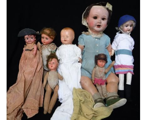 A COLLECTION OF VINTAGE DOLLS, to include a ceramic headed doll, stamped A.M., a celluloid headed doll and others similar, ma