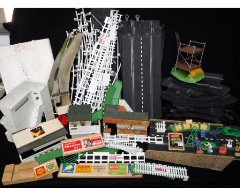 SCALEXTRIC: A COLLECTION OF VINTAGE TRACK, buildings, fencing, signs and figures 