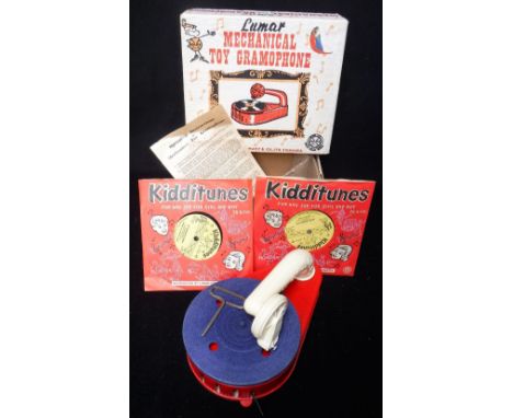 LOUIS MARX & CO LTD: A VINTAGE 'LUMAR' MECHANICAL TOY GRAMOPHONE, with original box, instructions and two small 78s