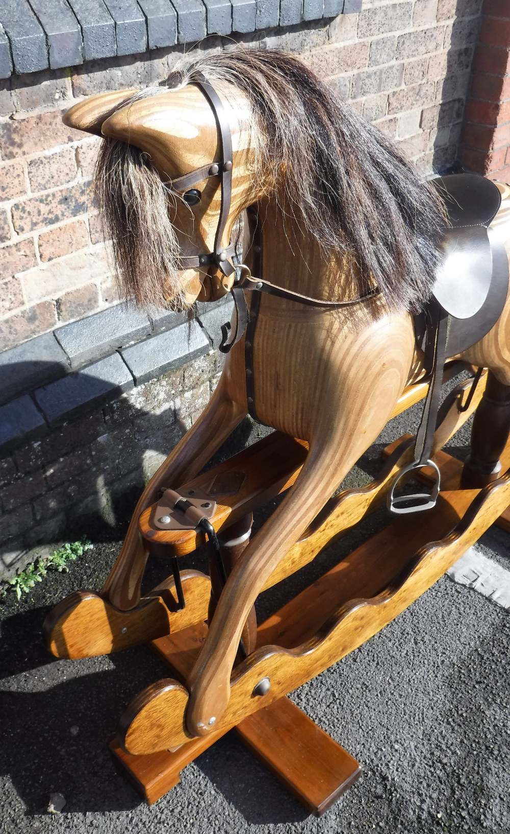 A LARGE VICTORIAN STYLE SAFETY ROCKING HORSE, made by 'Ian Armstrong
