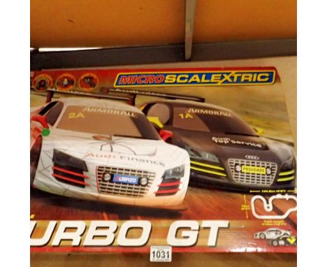 Boxed micro Scalextric Turbo GT, cars included. Not available for in-house P&amp;P