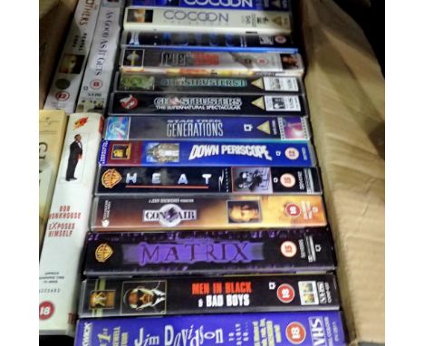 Shelf of classic VHS tapes to include Ghostbusters, Waynes World and Gladiator. Not available for in-house P&amp;P