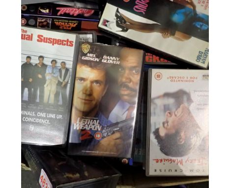 Shelf of classic VHS tapes to include Very Best of Thin Lizzy, The Usual Suspects, and Wes Cravens New Nightmare. Not availab