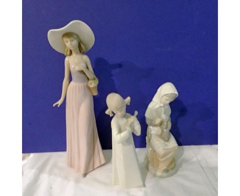 Three Lladro &amp; Nao figurines. Not available for in-house P&amp;P 