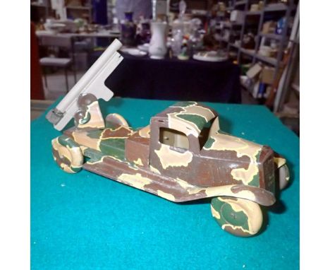 Wells Brimtoy clockwork tinplate, clockwork rocket launcher truck. Not available for in-house P&amp;P