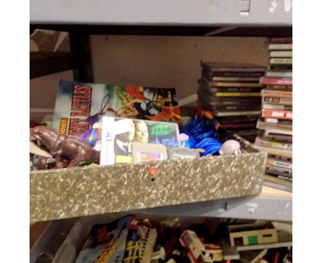 Shelf of indie/rock CDs and toys to include Gameboy and DS games. Not available for in-house P&amp;P 