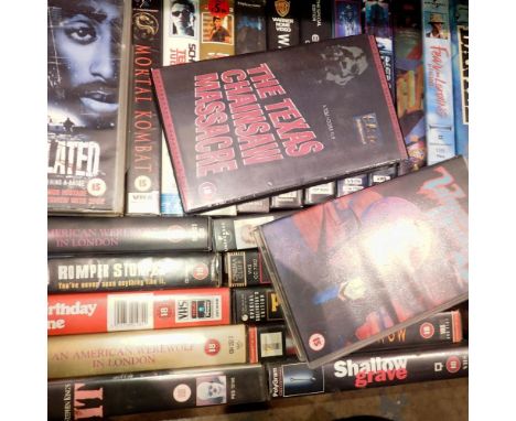 Thirty three mixed VHS tapes including Horror and Manga: Prom Night, The Texas Chainsaw Massacre, and Vampire Hunter D. Not a