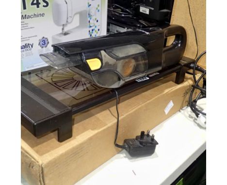 Electric hotplate and a Shark vacuum cleaner. All electrical items in this lot have been PAT tested for safety and have passe