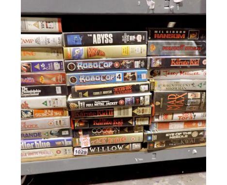 Shelf of classic VHS tapes to include The Fog, Airplane and Full Metal Jacket. Not available for in-house P&amp;P