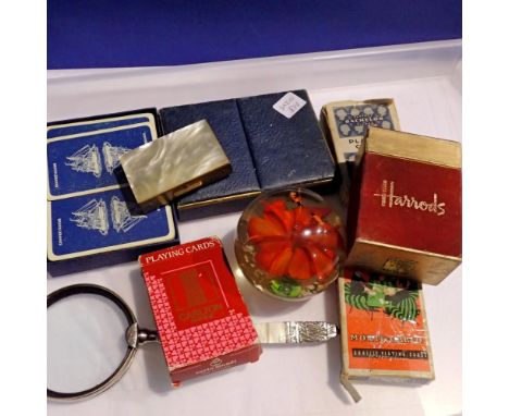 Packs of vintage playing cards with an art glass paperweight. mother of pearl magnifying glass and trinket box. Not available