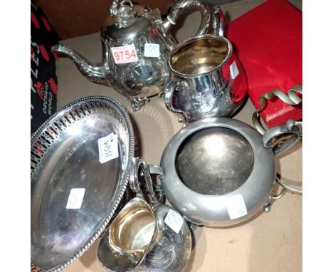 Collection of silver plated items including three piece tea set and three boxes of flatware. Not available for in-house P&amp