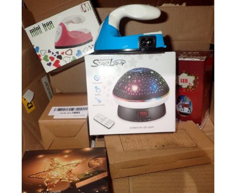 Mixed electricals, boxed to include star lamp, alarm clock and mini iron. Not available for in-house P&amp;P