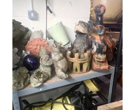 Shelf of garden ornaments including wooden bear. Not available for in-house P&amp;P 