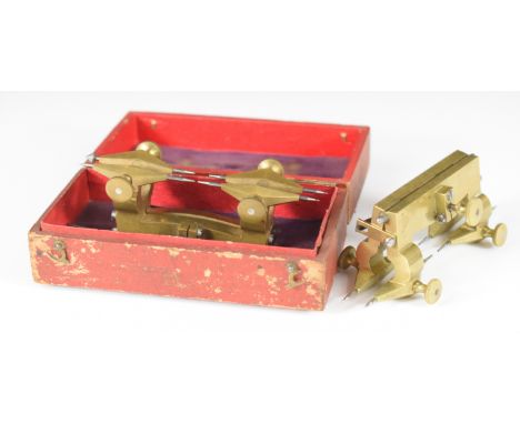 Two brass depthing tools, one cased