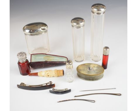 Four hallmarked silver lidded cut glass dressing table bottles, two further red glass bottles, lids unmarked, cased cheroot h