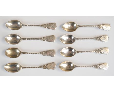 Set of eight Walker &amp; Hall hallmarked silver teaspoons with engraved crossed rifles or similar guns to top, various dates
