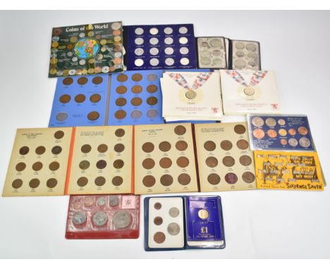 A collection of various coin presentation packs to include Whitman type folders, Commonwealth Games, first issues etc