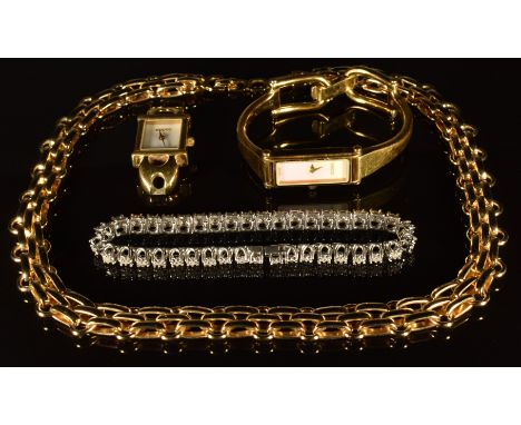 Two Gucci watches, Christian Dior necklace and a silver bracelet set with diamonds