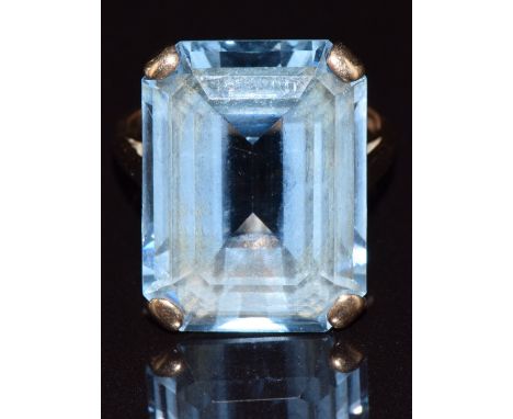 A 9ct gold ring set with an emerald cut blue topaz, Birmingham 19170, 8.5g, size N