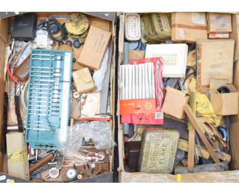 Collection of clock parts, keys, tools, needle files, engraver's wax, clamps etc, in three trays