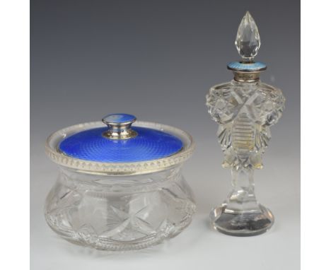Two hallmarked silver and blue guilloché enamel mounted cut glass dressing table items, diameter of larger 12cm